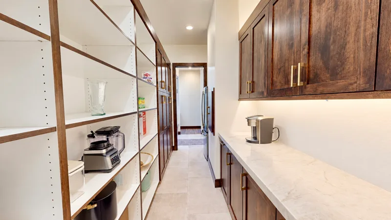 Knotty Alder Parade Home — custom cabinetry by Cozzens Cabinets, photo 8
